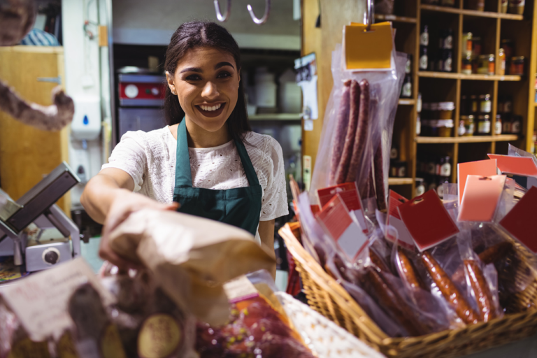 female-staff-working-meat-counter